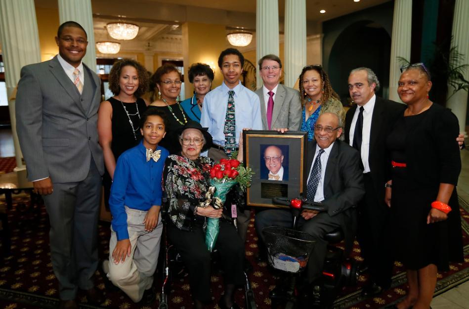 David C. Sarrett, D.M.D. (back row, fourth from right), dean of the VCU School of Dentistry, and family of the late Francis Foster, D.D.S, thank Ralph L. Anderson, D.D.S. (front row, far right), and his wife, Judy (back row, fourth from left), for their generous leadership gift establishing the Dr. Francis M. Foster Sr. Student National Dental Association Scholarship. The scholarship celebrates th